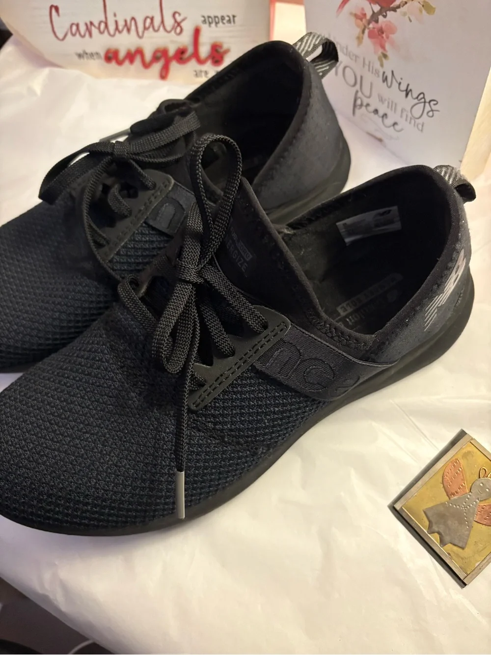 New Balance Woman’s Black Slip-On Knit Sneakers